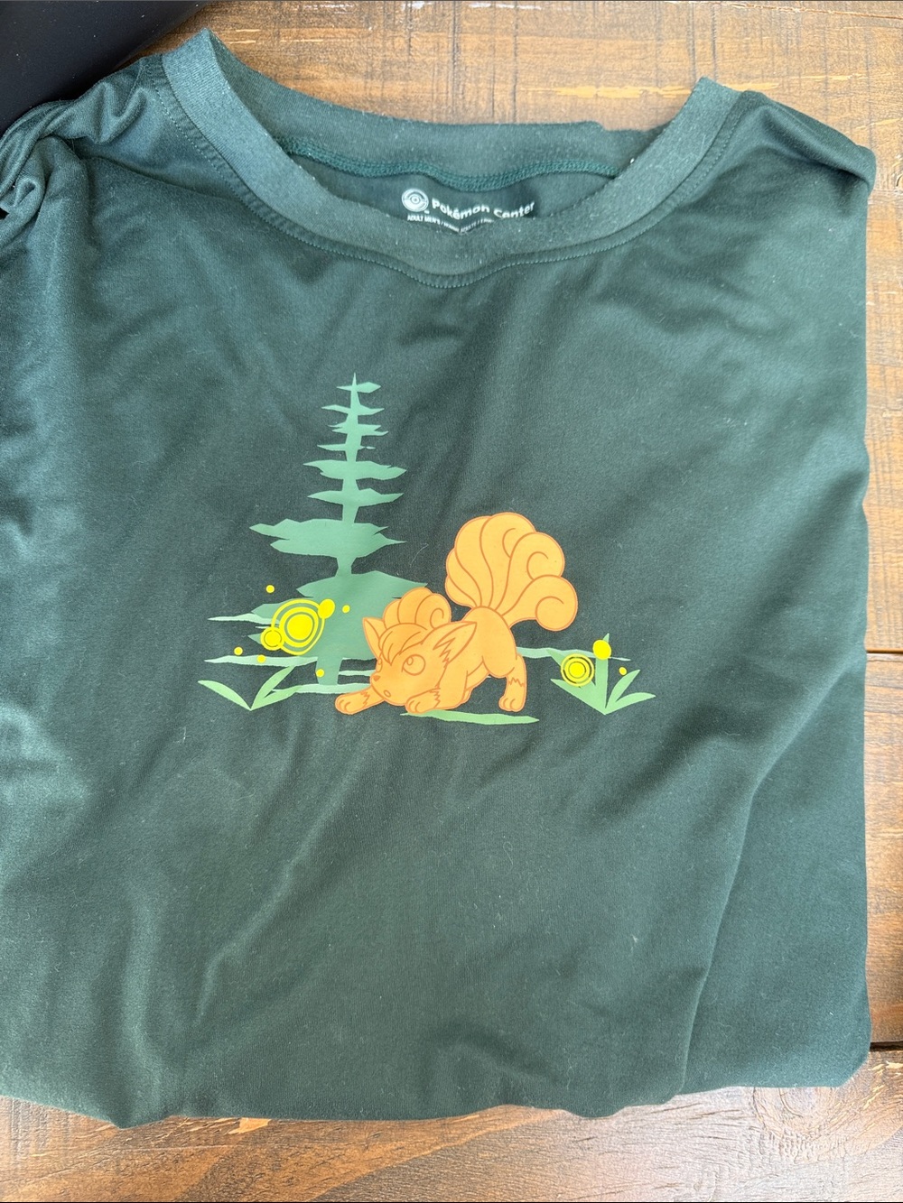 Pokemon Dark Green Tee with Orange Vulpix Graphic